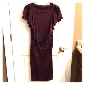 Ruffled sleek rayon dress.